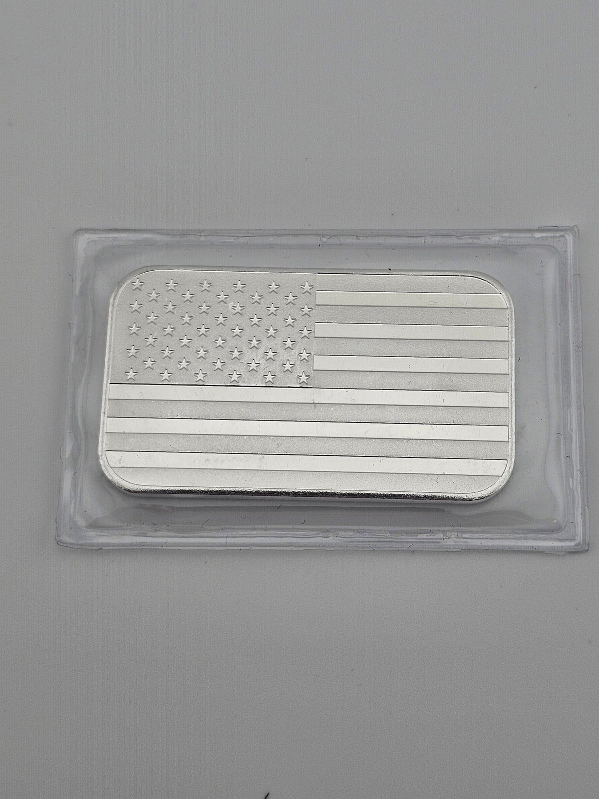 UNITED WE STAND U.S.A FLAG .999 FINE SILVER 1 OZ. BAR SEALED